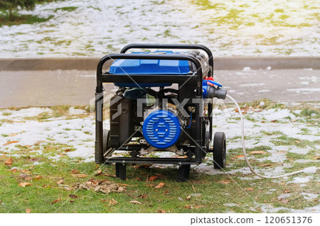 Problem with electricity. Portable gasoline or diesel generator to provide electricity. Mobile device. Winter. 120651376