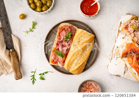 Baguette sandwich with prosciutto or jamon 120651384