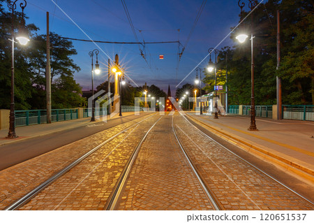 The Church of the Holy Saviour in Poznan and the Theatre Bridge at dawn. 120651537