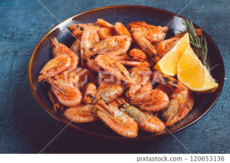 fried shrimp, with shell and head, unpeeled, size 70-90, on a blue background, homemade, no people, 120653136