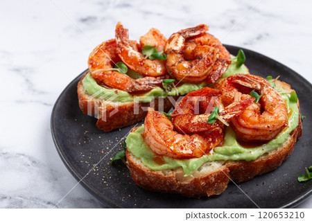sandwiches with avocado and caramelized shrimp, micro-greens, breakfast, on a plate, top view, homemade, no people, 120653210