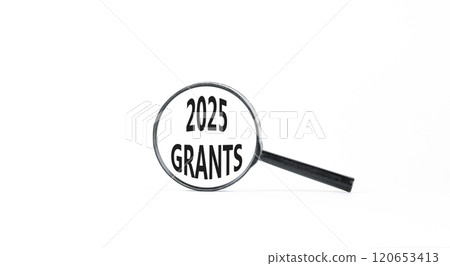 Planning 2025 grants new year symbol. Concept words 2025 Grants on beautiful white paper in magnifying glass. Beautiful white paper background. Business 2025 grants new year concept. Copy space. Planning 2025 grants new year symbol. Concept words 2025 Grants on beautiful white paper in magnifying glass. Beautiful white paper background. Business 2025 grants new year concept. Copy space. 120653413