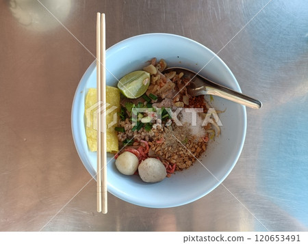 noodle with meetball in a blow on stainless table 120653491
