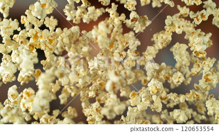 Freeze motion of flying tasty popcorn, close-up 120653554