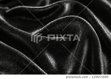 Shimmering Black Fabric with Elegant Folds 120653890