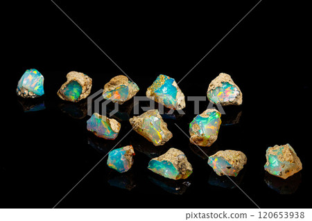 macro mineral stone rare and beautiful opals on a black background 120653938