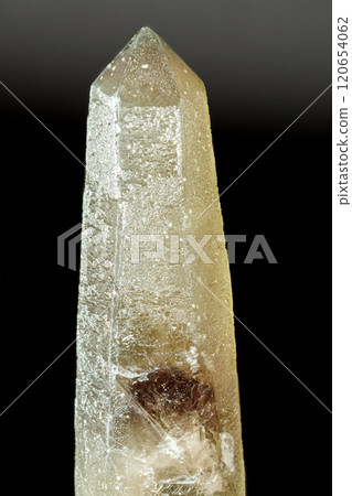Macro mineral stone Prase with amethyst phantom on a gray background Macro mineral stone Prase with amethyst phantom on a gray background 120654062