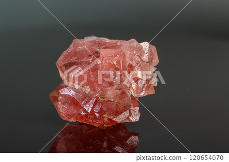 macro mineral stone pink fluorite on a black background macro mineral stone pink fluorite on a black background 120654070