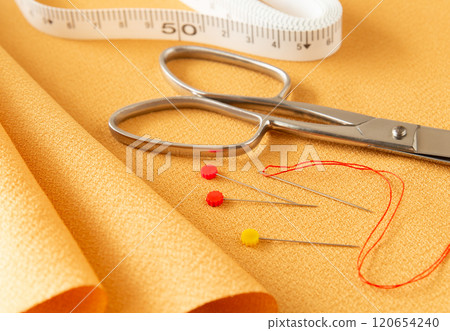 Needle, fabric, tape measure, fabric scissors, sewing tools, safety pins Needle, fabric, tape measure, fabric scissors, sewing tools, safety pins 120654240