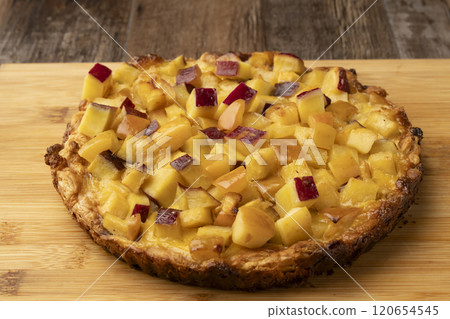 Freshly baked sweet potato and apple quiche, tart and pie Freshly baked sweet potato and apple quiche, tart and pie 120654545