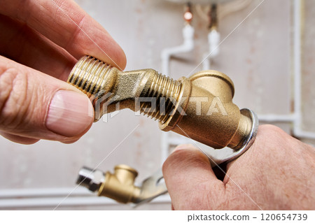 Male tap eccentric reducer dog legs screws into shower faucet mounting bracket. Male tap eccentric reducer dog legs screws into shower faucet mounting bracket. 120654739