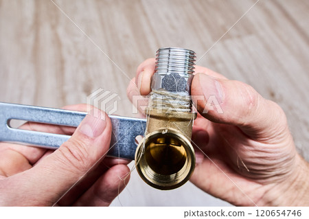 Using plumbing flax with sealing paste to seal threaded connection of hexagonal nipple of barrel. Using plumbing flax with sealing paste to seal threaded connection of hexagonal nipple of barrel. 120654746