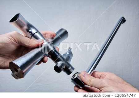 Installing bath and shower mixer tap with handle lever made of stainless steel Installing bath and shower mixer tap with handle lever made of stainless steel 120654747