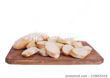 Fresh sliced baguette on wooden board isolate on white background. Bread 120655416