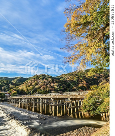 Arashiyama Togetsukyo Bridge, autumn leaves and blue sky in autumn Arashiyama Togetsukyo Bridge, autumn leaves and blue sky in autumn 120655613