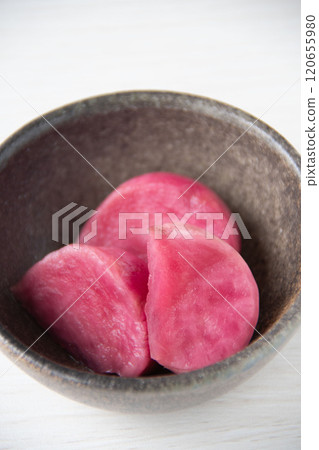 Atsumi turnip pickles served on a small plate 120655980