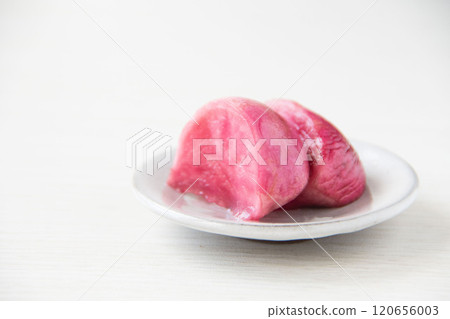 Pickled Atsumi turnips served on a small plate 120656003