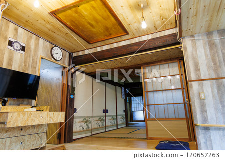 The renovated fishing hut of a friendly captain. The dirt floor wall is made of fake rock and mortar. 120657263