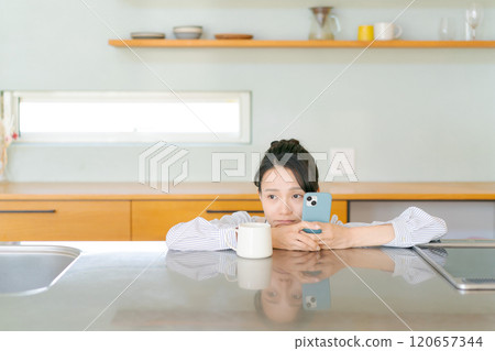A woman tired of housework 120657344