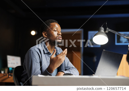 Confused person looking for ways to finish his tasks at home, working remotely from workstation. Employee trying to solve executive operations at laptop, reading files and learning practices. 120657714