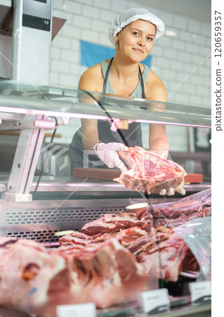 saleswoman expertly showcases selection saleswoman expertly showcases selection 120659357