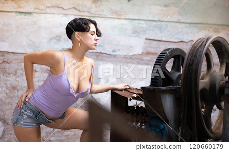 Desirable of woman in derelict factory Desirable of woman in derelict factory 120660179