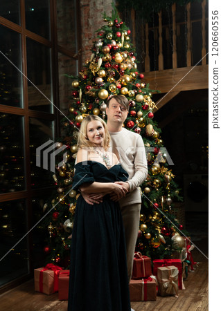 december christmas smiling decoration man joy celebration happiness winter tree woman family december christmas smiling decoration man joy celebration happiness winter tree woman family 120660556