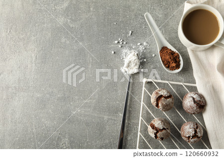 Delicious crinkle cookies on a baking sheet. 120660932
