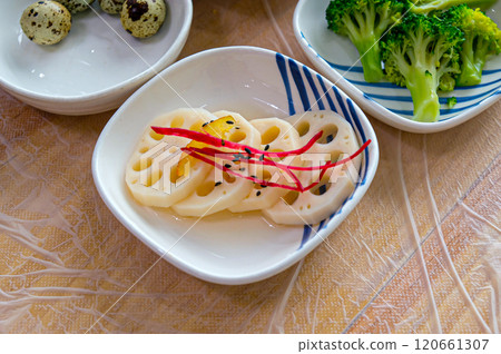 Korean style side dishes. a lotus root salad 120661307