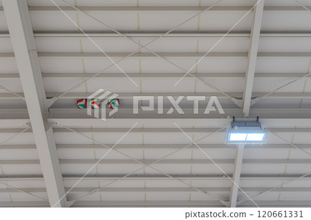 A ball stuck in the gymnasium ceiling 120661331