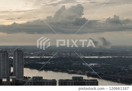 Aerial view of Bangkok city and beautiful clouds in sky background with the Chao Phraya River before sunset. Aerial view of Bangkok city and beautiful clouds in sky background with the Chao Phraya River before sunset. 120661387