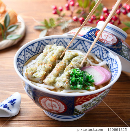 Deep-fried udon noodles with chikuwa and seaweed Deep-fried udon noodles with chikuwa and seaweed 120661825