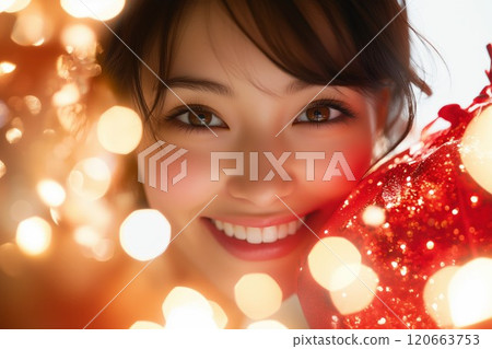 Young woman happy to receive a present 120663753