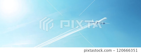 White passenger airplane is flying high in the blue sky, leaving a trail of white smoke behind it. The sun is shining brightly in the sky 120666351