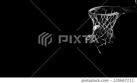 Basketball going through the net on a dark background, capturing the moment of success and the thrill of victory in a sport 120667211