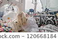 Medical professional capturing images of advanced life support equipment inside an air ambulance helicopter 120668184