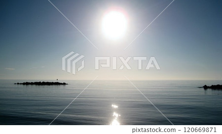The sea where the sun reflects The sea where the sun reflects 120669871