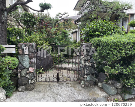 old neighborhoods in Japan. metal gates 120670239