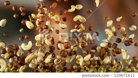 Mix of Various Kind of Nuts Flying up in the Air. 120671611