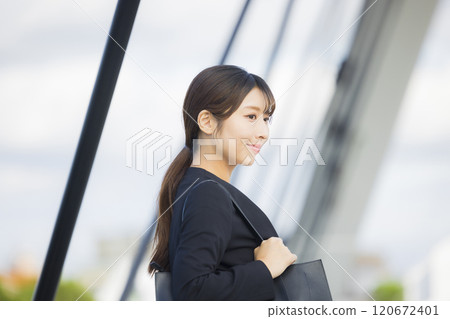 business woman wearing a suit business woman wearing a suit 120672401