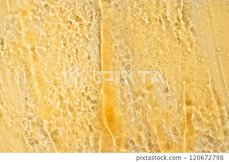 Gold gel rectangle smear closeup on white background 120672798