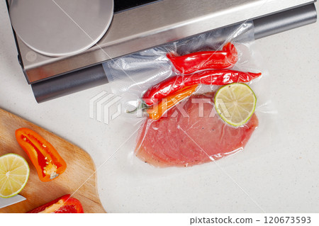 Vacuum Sealed Meat with Peppers and Lime 120673593