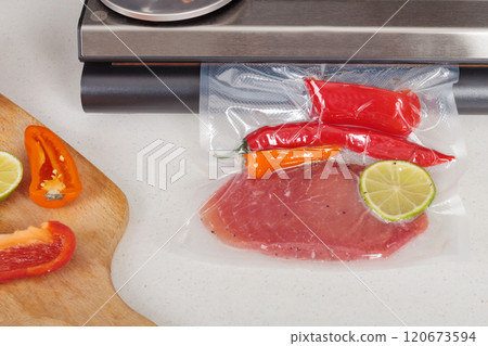 Vacuum Sealed Beef with Chili Peppers and Lime 120673594