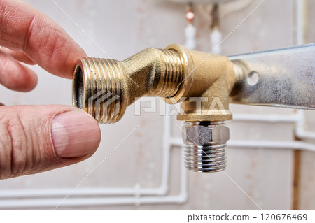 Male tap eccentric reducer dog legs screws into shower faucet mounting bracket. 120676469