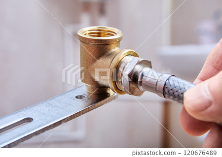 Connecting braided hose to an elbow fitting with internal threads. 120676489
