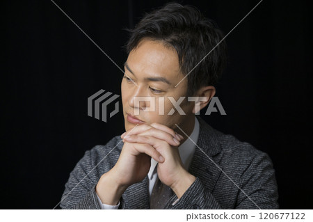 Businessman on black background Businessman on black background 120677122