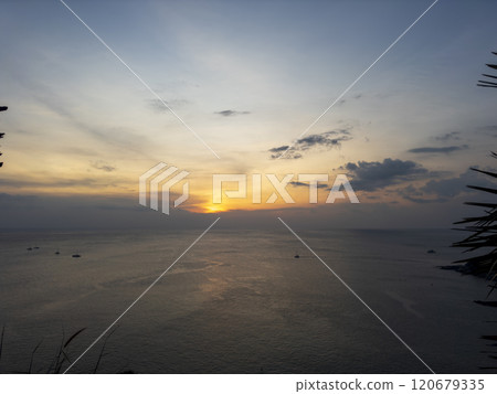 Promthep cape viewpoint at sunset in Phuket, Thailand. Promthep cape viewpoint at sunset in Phuket, Thailand. 120679335