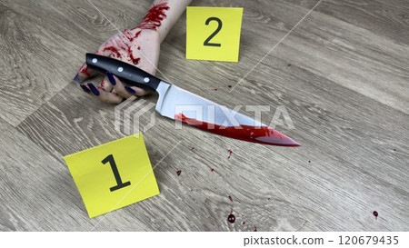 Crime scene with evidence markers and body with bloody knife in hand on floor. Dead girl with traces of blood on her hand and murder weapon for crime project Crime scene with evidence markers and body with bloody knife in hand on floor. Dead girl with traces of blood on her hand and murder weapon for crime project 120679435