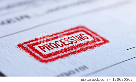 Close up of document featuring bold red PROCESSING stamp, symbolizing ongoing administrative tasks and workflows. textured paper adds depth to image 120680502