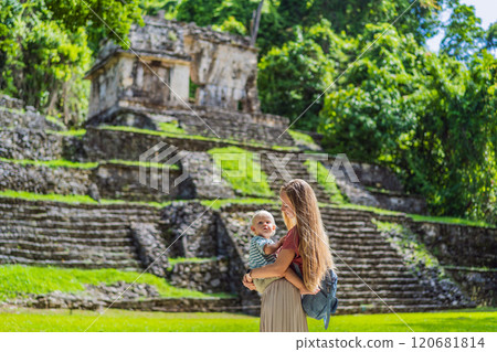 Mother and son tourists exploring the ancient pyramids of Palenque, Mexico, surrounded by dense jungle. Cultural heritage and adventure travel concept Mother and son tourists exploring the ancient pyramids of Palenque, Mexico, surrounded by dense jungle. Cultural heritage and adventure travel concept 120681814